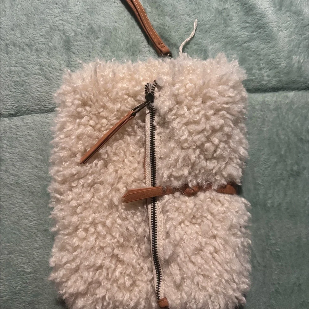 Universal Thread Cream Fuzzy Clutch with Tan Strap